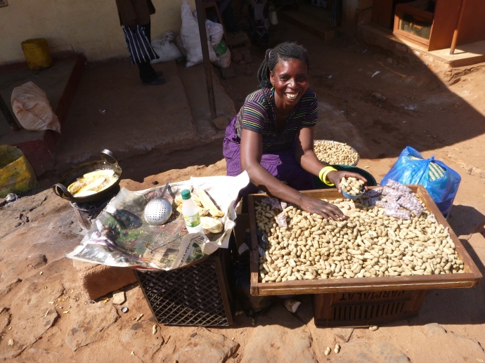 This woman sold us groundnuts and the last of her fried sweet potatoes - then kindly consented to a photo.