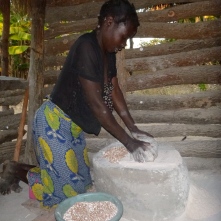 Ba Deria, grinding millet. That's "ukupela amale," in Bemba.