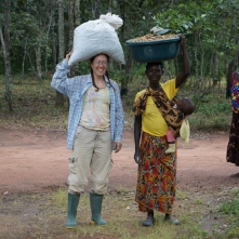 Me and Ba Lister carrying groundnuts from my field.