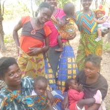 Ladies of Mfuba, posing in their ever-colorful outfits.