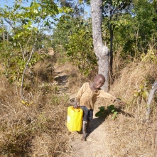Katongo is such a strong little dude! He regularly insists on lugging heavy things for me - including this 10-liter jug of water.