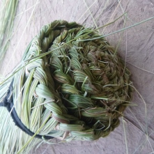 Finished broom made from wetland grasses.