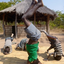 This just happened in my yard one day. Stephen, aka Bwalya, started doing head stands. Then the smaller kids all wanted to try.