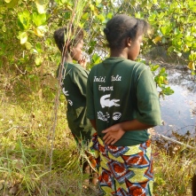Cynthia and Gertrude looking for floating plants in the Lukulu River.
