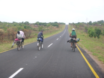 Lucas biking with friends on the way from Kawambwa to Lumangwe Falls.