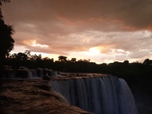 Sunset and storm clouds over Lumangwe Falls on our last night there.