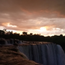 Sunset and storm clouds over Lumangwe Falls on our last night there.
