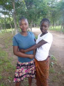 GLOW girls Harriet and Mwape.