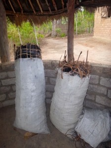 The evidence: bags of charcoal in my nsaka. Neither bag was made under permit.